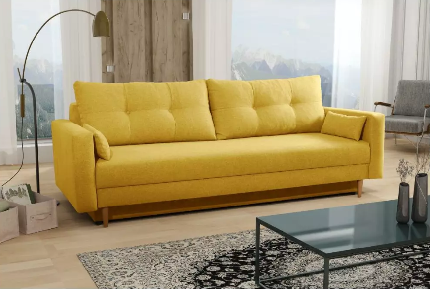 Modern mustárszínű kanapé dohányzóasztallal, állólámpával olvasáshoz